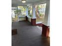 Relaxing front porch with brick detailing offers a great space for outdoor enjoyment at 315 Highland St, Brooksville, FL 34601