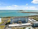 High angle view of a condominium complex with beautiful water views and nearby covered parking at 9 Forbes Pl # 512, Dunedin, FL 34698