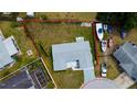 Aerial view of the property highlighting the lot size, landscaping, and proximity to waterfront at 2620 Baltic Pl, Holiday, FL 34691