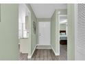 Bright foyer with modern flooring, offering a seamless transition into the inviting interior living spaces at 4831 Wakefield Ct, New Port Richey, FL 34655