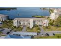 Beautiful waterfront condominium with lush landscaping, covered parking, and serene water views at 8251 Brent St # 918, Port Richey, FL 34668
