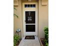 Charming front door with decorative accents and inviting curb appeal at 8405 Blue Rock Dr, New Port Richey, FL 34653
