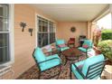 Inviting patio with comfortable seating, perfect for outdoor entertaining and grilling with a gas BBQ at 9321 Whitstone Ct, New Port Richey, FL 34655