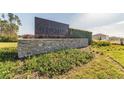 Copper Spring community sign, stone with landscaping at 6068 Apple Snail Ave, New Port Richey, FL 34653