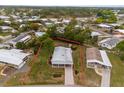Spacious property featuring a well-maintained home, lush greenery, and defined property lines in a serene neighborhood setting at 7506 Moriah Ave, Brooksville, FL 34613