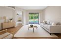 Bright living room with a large sliding glass door leading to the pool area, and a beige couch with light wood flooring at 5412 Merkin Pl, New Port Richey, FL 34655