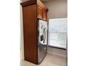 Kitchen featuring a stainless steel refrigerator and a bright window at 3037 Leroy W St, Tampa, FL 33607
