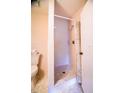 Tiled shower with neutral decor, white fixtures, and practical design at 6710 Hickorywood Ln # 1B, New Port Richey, FL 34653