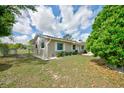 Well-maintained house with landscaped backyard and white rock ground cover at 12478 Prescott St, Spring Hill, FL 34609