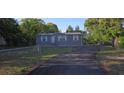 Charming single-story home features a well-maintained yard, driveway, and appealing exterior paint at 9625 Pat St, Hudson, FL 34669
