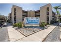 Exterior shot of the Rivermist Condominiums complex showing its architecture and landscaping details at 5640 Ferguson Ct # 2106, New Port Richey, FL 34652