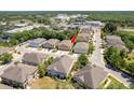 Aerial view of townhomes in a community, conveniently located near shopping centers at 7500 Red Mill Cir, New Port Richey, FL 34653
