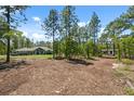 Spacious lot with mature trees surrounding a well-maintained single Gathering home at 11730 Hawks Nest Trl, Brooksville, FL 34614