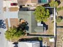 Aerial view of the home showcasing the roof, yard, and proximity to other homes at 12065 Shadow Ridge Blvd, Hudson, FL 34669