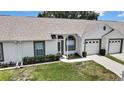 Charming single story home with well-maintained lawn and one-car garage at 4030 Casa Del Sol Way, New Port Richey, FL 34655