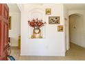Welcoming foyer features tiled flooring, decorative niche, and an inviting view into the home at 2325 Pleasant Hill Ln, Holiday, FL 34691
