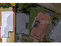 Birds eye view of property showcasing layout, roof and proximity to neighborhood homes at 9237 Penelope Dr, Weeki Wachee, FL 34613