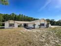 Charming single-story home featuring neutral exterior and a well-manicured front yard at 10228 Beechcraft St, New Port Richey, FL 34654