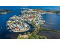 Aerial view of property location on a canal in a private neighborhood at 5040 Waterside Dr, Port Richey, FL 34668