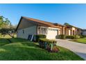 This single Gathering home is complemented by mature landscaping and a well manicured lawn at 5931 Precious View Ct, New Port Richey, FL 34655