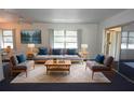 Bright living room with modern furniture and natural light at 6327 Skyline Ct, Spring Hill, FL 34606