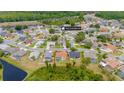 Aerial view of property with a pool, in a neighborhood close to the Suncoast Parkway at 7827 Starfire Way, New Port Richey, FL 34654