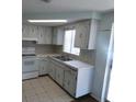Functional kitchen features a double sink and plenty of storage at 3214 Pinon Dr, Holiday, FL 34691
