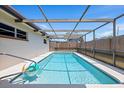 Enjoy the Florida sun in this refreshing pool featuring an attached pergola and plenty of space for entertaining at 3534 Cockatoo Dr, New Port Richey, FL 34652