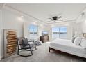 Serene bedroom with lots of natural light and tranquil water views, creating a peaceful retreat at 4550 Bay Blvd # 1231, Port Richey, FL 34668