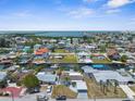 A scenic aerial view of the waterfront community, showcasing its idyllic location and canal access at 13411 Lisa Dr, Hudson, FL 34667