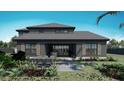 Backyard with a dining space and low maintenance landscaping at 5477 Creek Ridge Rd, Brooksville, FL 34601