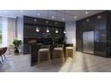 Modern kitchen with dark cabinets, marble countertops, steel appliances and gold bar stools at 5477 Creek Ridge Rd, Brooksville, FL 34601