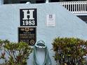 A smoke-free community building featuring neighborhood watch and emergency contact information at 1983 Abrico Dr # H-9, Lutz, FL 33558