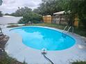 Backyard pool, perfect for relaxation and entertainment at 2083 Envoy Ct, Clearwater, FL 33764