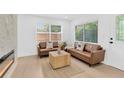 Cozy living room with two sofas, natural light, and stylish decor at 5753 2Nd N Ave, St Petersburg, FL 33710