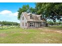 Charming two-story home with a welcoming front yard and lovely curb appeal at 7089 Goodway, Brooksville, FL 34602