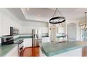 Modern kitchen featuring stainless steel appliances and ample counter space at 4048 St Ives Blvd, Spring Hill, FL 34609