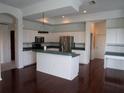 Spacious kitchen with stainless steel appliances, plenty of storage, and stylish countertops at 4048 St Ives Blvd, Spring Hill, FL 34609
