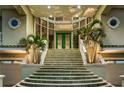 Grand entrance features a wide staircase leading to the front door with transom windows at 4348 Harborpointe Dr, Port Richey, FL 34668