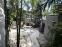 Secluded backyard with serene seating and relaxing spa, ideal for outdoor enjoyment at 441 75Th N Ave # 441, St Petersburg, FL 33702