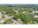 Birds eye view of wooded neighborhood with well kept properties at 9401 Bourbon St, New Port Richey, FL 34654