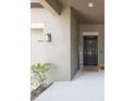 Inviting front entrance with a welcome sign and stylish decor at 12313 Criollo Rd, Spring Hill, FL 34610