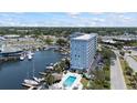 Waterfront condo building features a private marina, waterfront pool, and ample parking at 4939 Floramar Ter # 611, New Port Richey, FL 34652