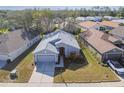 Expansive aerial view of the home showcasing its position within the quiet neighborhood at 11637 Spindrift Loop, Hudson, FL 34667