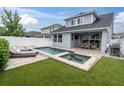 Backyard pool and spa, surrounded by a patio area, perfect for entertaining and relaxation at 15241 Caravan Ave, Odessa, FL 33556
