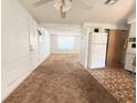 Open-concept living area seamlessly connects to the kitchen at 4142 Crestfield Ave, Holiday, FL 34691