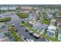 Beautiful waterfront home with boat dock, pool, and lush landscaping at 6140 Seaside Dr, New Port Richey, FL 34652