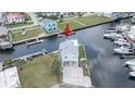 Waterfront home with dock and boat access, perfect for nautical living at 6322 Aureau Ave, Hudson, FL 34667