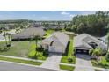 Spacious home with a large yard, well-kept lawn, and proximity to a pond at 12027 Yellow Finch Ln, Trinity, FL 34655