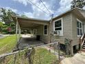 Covered carport area with a view of the back and side of the home at 221 Highland St, Brooksville, FL 34601